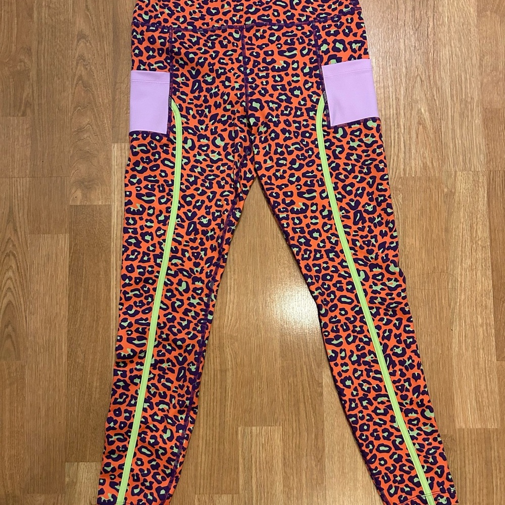 Peloton  Brittany Allen Orange and Purple Leopard Print Leggings, Like New